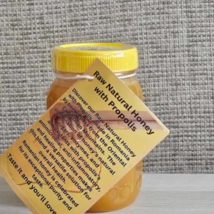 Raw Natural honey with propolis side view